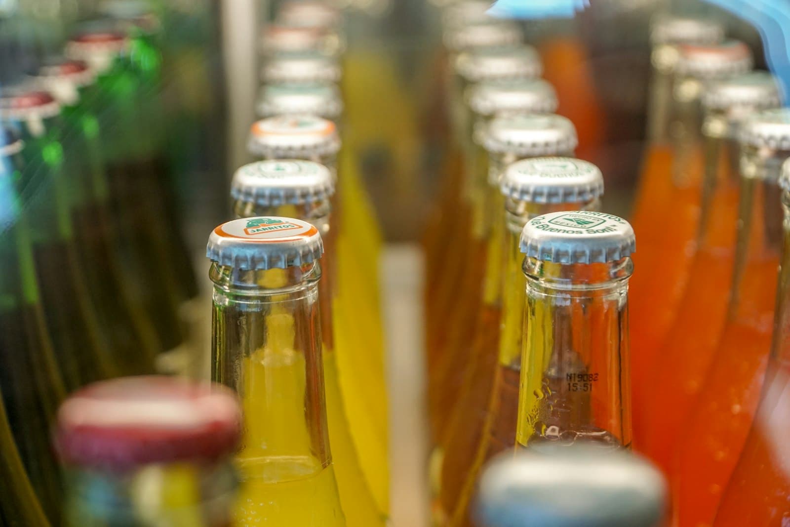 Glass bottles of soft drinks and juices